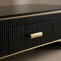 The Knightwood Coffee Table: A Symphony of Shadow and Gold.
