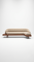 The Élan Curved Sectional styled in a modern, open-concept living room paired with a neutral rug and minimalist decor, emphasizing its role as a contemporary sculptural centerpiece.